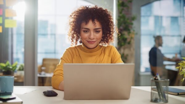 Beautiful Middle Eastern Manager Sitting At A Desk